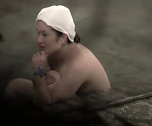 Chubby Asian mature in Jacuzzi on the showers voyeur cam nri018 00