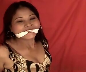 Cute Asian chick hogtied here